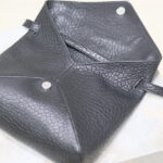 Saint Laurent Cassandre Envelope Messenger In Lambskin Black